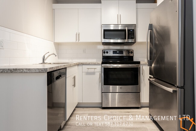 Building Photo - Basement Suite With Driveway Parking and Laundry In Unit