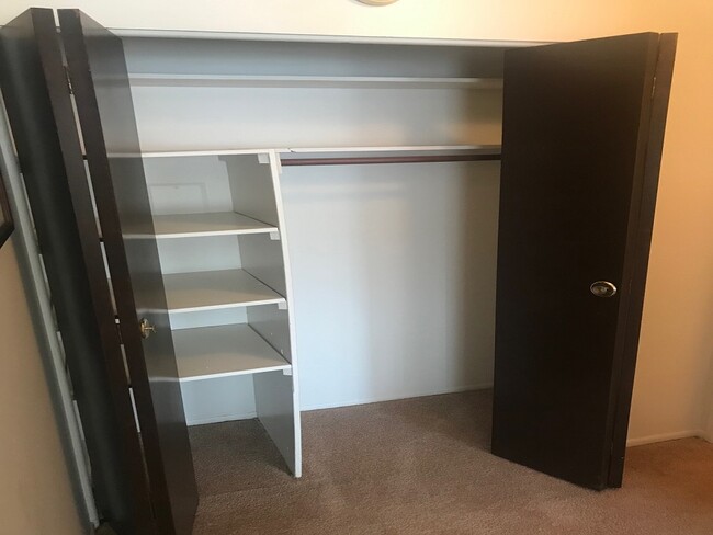 Hall Closet/Pantry - Golden Tree Apartments, A 55+ Community