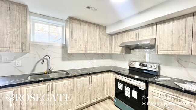 Building Photo - Newly Renovated 2-Bedroom Basement Unit in...