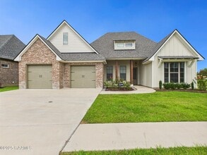 Building Photo - 104 Carriage Lakes Dr