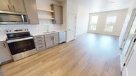 This well-designed 600 square foot apartment in Fargo, North Dakota, offers a perfect blend of comfort and functionality. The single-floor layout comprises one bedroom, one bathroom, and an open-concept kitchen and living area. The primary bedroom, measuring 130 square feet, provides ample space and features plush carpeting and a large window for natural light.

The kitchen is a highlight, boasting modern light-colored cabinetry, stainless steel appliances, and a stylish geometric tile backsplash. The layout is efficient, with ample counter space and storage. Warm wood-toned flooring extends from the kitchen through the living area, creating a seamless and inviting atmosphere.

Large windows in the living room and bedroom offer expansive views and flood the space with natural light, enhancing the apartment's open feel. The bathroom features a pristine white tub-shower combination with built-in shelving for convenience.

A notable amenity is the in-unit laundry room, equipped with a full-sized washer and dryer, complete with overhead shelving for storage. Throughout the apartment, recessed lighting and neutral wall colors contribute to the bright, contemporary ambiance.

Located at 1110 16th Ave S in Fargo, this apartment combines modern living with practical design, making efficient use of its 600 square feet to create a comfortable and stylish home.