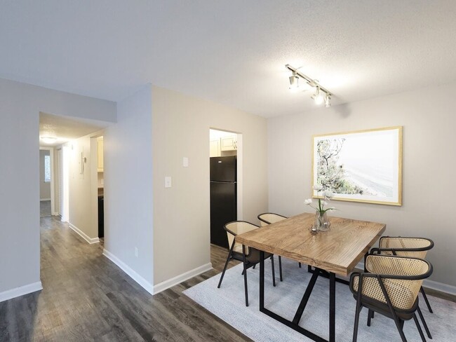 Dining Area with Modern Overhead Light - Colony Village