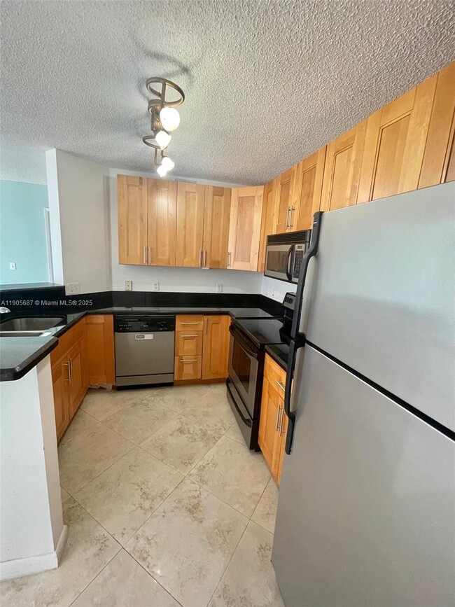 Foto del edificio - 19999 E Country Club Dr