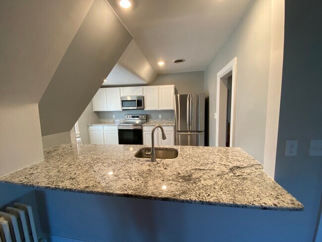 Kitchen from living room - 620 W Ferry St