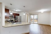 Discover the epitome of modern living at 4321 North Towne Ct, Windsor WI. This captivating three-story home beckons those who aspire to a life of comfort and elegance. As you step inside, you're greeted by an open-concept living area that seamlessly blends the kitchen and living room, creating an ideal space for both relaxation and entertainment.

The heart of the home, the kitchen, boasts rich wood cabinetry, sleek stainless steel appliances, and stunning granite countertops. Pendant lighting adds a touch of sophistication, while the breakfast bar offers a perfect spot for casual dining or morning coffee.

Ascend the stylish staircase to find three generously sized bedrooms, including a luxurious 150 sq ft primary suite. Each bedroom is bathed in natural light from large windows, promising serene mornings and peaceful nights. The three well-appointed bathrooms feature modern fixtures and ample storage, ensuring comfort for both family and guests.

Throughout the home, warm wood flooring creates a cohesive and inviting atmosphere. The neutral color palette serves as a blank canvas, allowing you to express your personal style. With a utility room and garage, this home combines practicality with elegance.

Located in the desirable Windsor area, this property offers not just a house, but a lifestyle. Imagine weekends spent exploring local amenities or evenings relaxing in your own private oasis. This is more than a home; it's the backdrop for the life you've always envisioned. Your dream of sophisticated, comfortable living starts here.