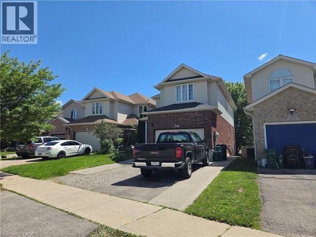 Building Photo - 709 Windflower Crescent