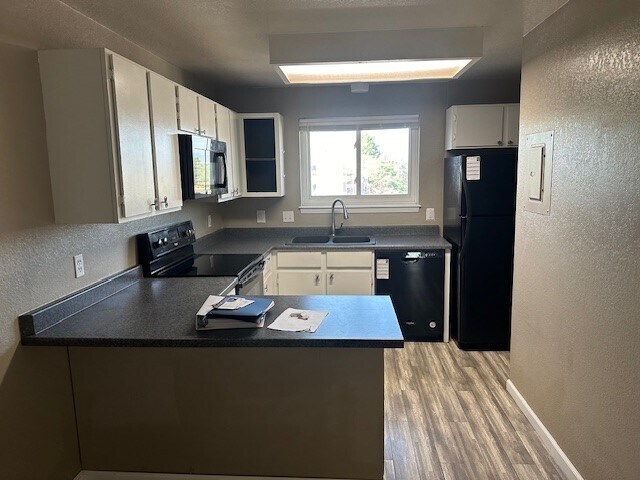 OPEN KITCHEN W BLACK APPLIANCES - 8645 Clay St