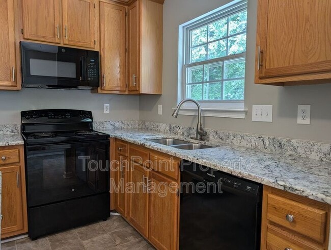 Foto del edificio - 10002 Baxter Caldwell Dr