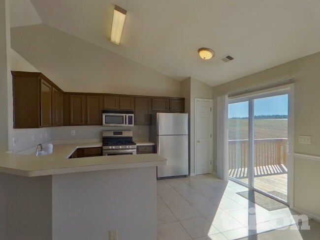 Building Photo - 7955 Streamside Ln