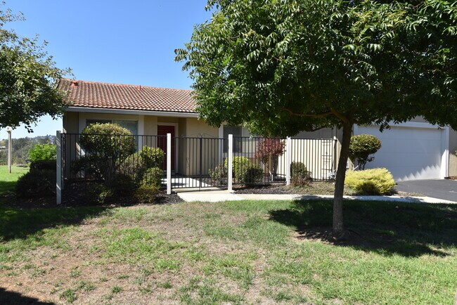 Gated garden in front - 137 Mountain Valley St