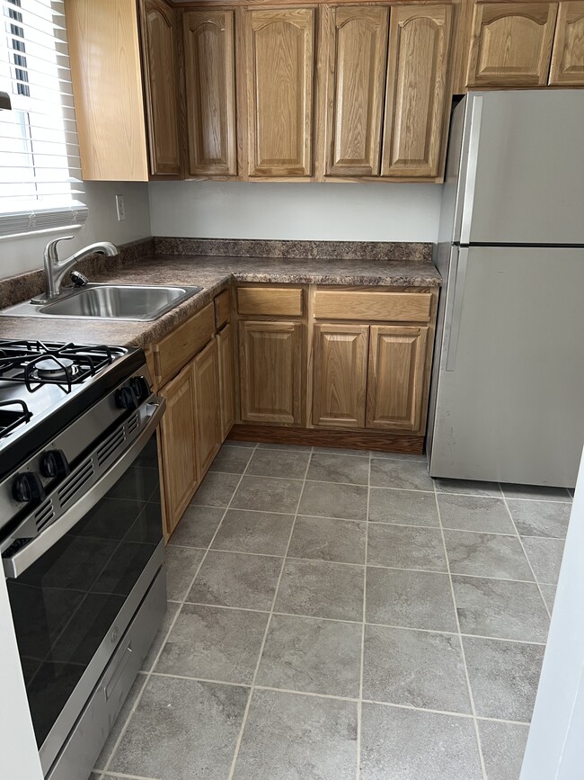 Cocina espaciosa - Park Brook Gardens