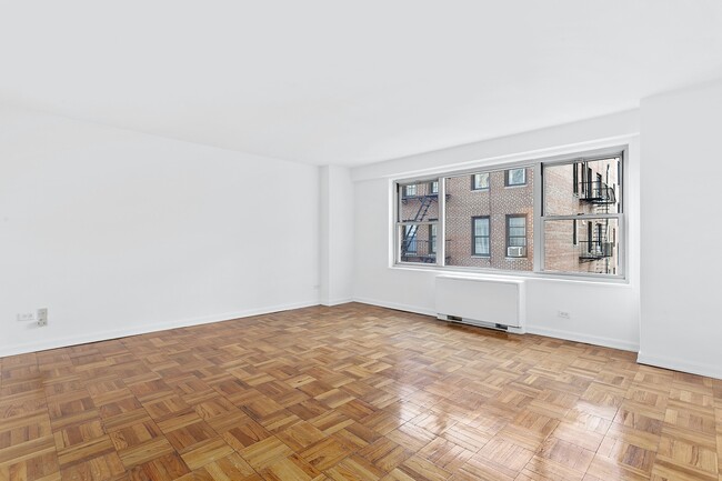 Building Photo - Large East 80th Street Doorman Studio.