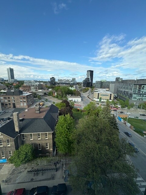 Photo du bâtiment - 1-Bedroom Condo That Checks Every Box – Bright, Open, and Thoughtfully Designed