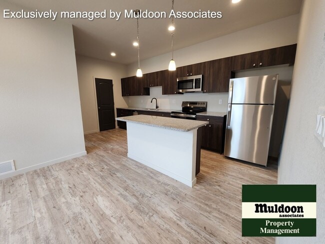 Building Photo - Brand new duplex unit available now!