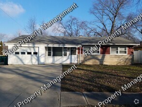 Building Photo - 614 W 67th Ln