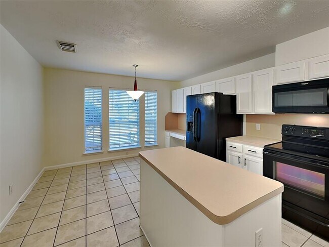 Foto del edificio - 10719 Scenic Dr