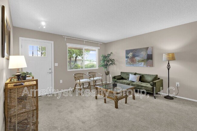 Building Photo - 10547 W Coggins Dr