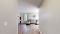 Located in Altamonte Springs, FL, this well-appointed 1-bedroom, 1-bathroom home offers a thoughtfully designed single-floor layout. The open-concept living and kitchen area serves as the heart of the home, featuring warm wood-style flooring throughout and a textured ceiling that adds character. The living room is bright and welcoming, with a large window and sliding glass door that invite generous natural light and provide access to a private balcony overlooking lush greenery.

The kitchen is a standout feature, showcasing granite countertops, crisp white cabinetry, a classic subway tile backsplash, and a full suite of stainless steel appliances including a refrigerator, range, microwave, and dishwasher. A peninsula with seating creates a functional and stylish space for casual dining.

The bedroom is a comfortable retreat with wood-style flooring, a ceiling fan, and a window that fills the room with natural light. It connects directly to the bathroom and includes access to a dedicated closet. An in-unit laundry area with washer hookups adds everyday convenience. Neutral tones throughout create a clean, modern ambiance, making this home a practical and inviting space in a desirable Florida location.