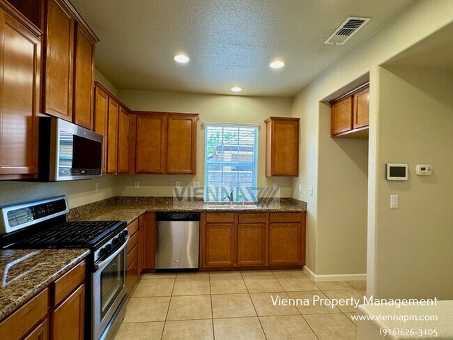 Building Photo - 6136 Passiflora Ln
