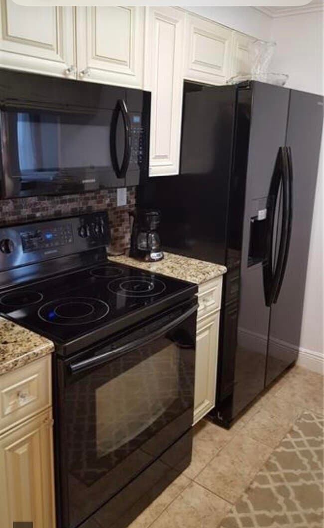 Building Photo - 9466 Boca Cove Cir