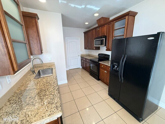 Foto del edificio - 7116 W Mead Ave