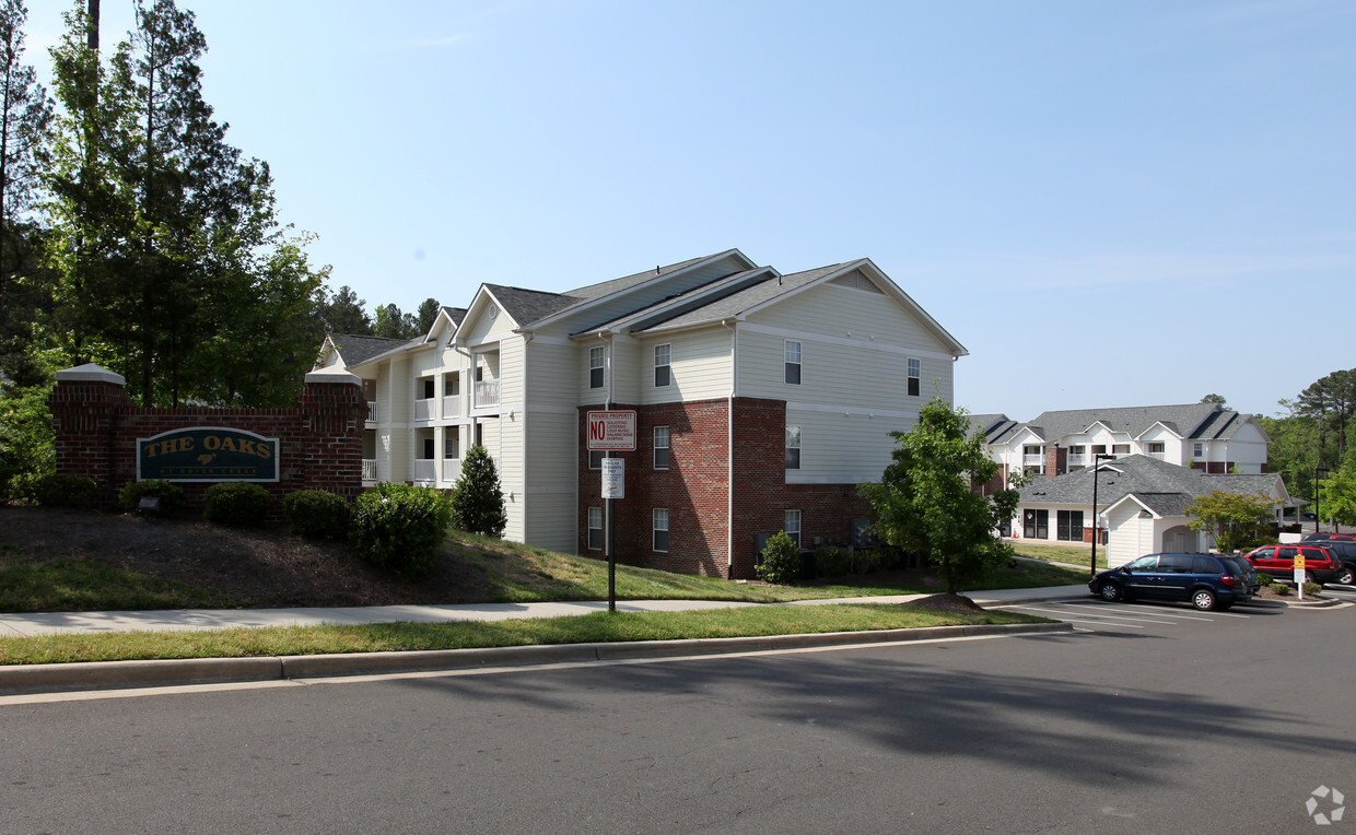 Building Photo - The Oaks at Brier Creek