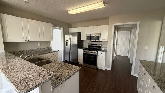 Building Photo - 4BR Home with High Ceilings & Main-Level Suite In Hillgrove District