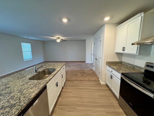 Building Photo - Located in Creedmore Hills a 4BR/2.5BA home with 2 car garage