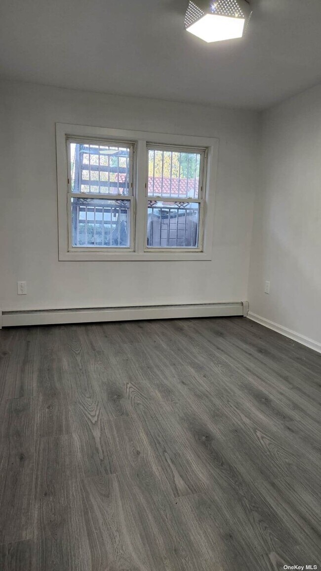 Building Photo - 124-14 6th Ave