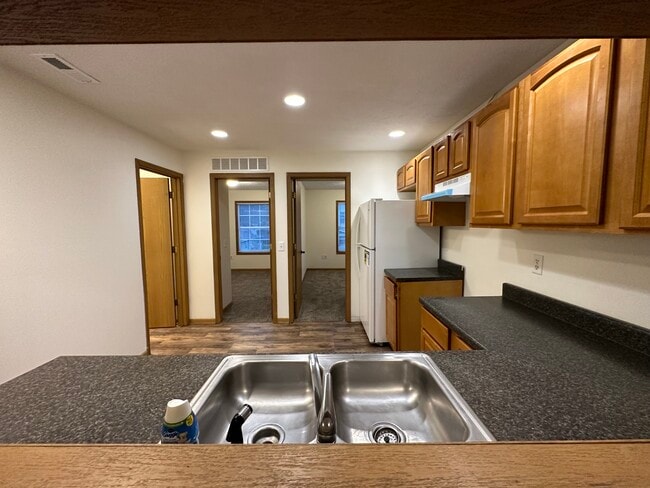 View of the Kitchen from Living Room - 407 E Jackson St