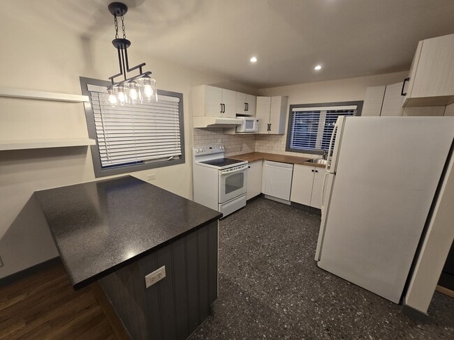 Photo du bâtiment - 938-938 Weatherdon Ave