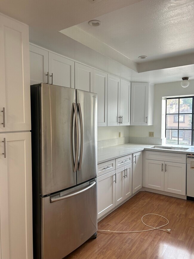 Newly renovated kitchen cabinets and countertop and dishwasher - 2319 Presado Dr
