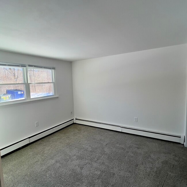 Building Photo - The Den at Hunting Lodge
