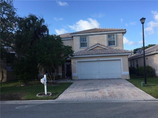 Building Photo - 8559 NW 46th Dr