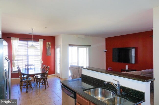 Breakfast room and FR - 15815 John Diskin Cir