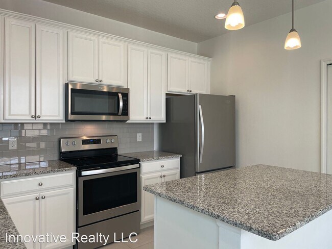 Building Photo - 3 br, 2.5 bath House - 6886 Tussilago Way