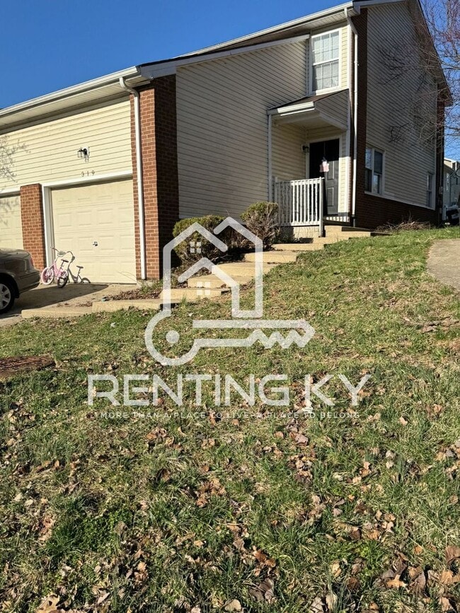 Building Photo - Updated 2-Bed, 1.5-Bath Townhome with a Ga...