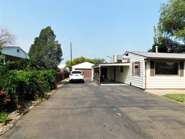 Building Photo - Updated house with original hardwoods and 2-car garage!