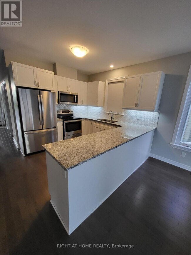 Photo du bâtiment - 182 Boxcar Cres