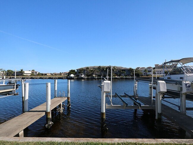 Building Photo - BEAUTIFUL 3-BEDROOM  WATERFRONT CONDO WITH BOAT SLIP AND HEATED POOL