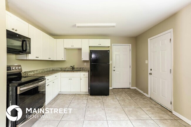 Foto del edificio - 5922 Heatherwood Ln