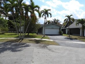 Building Photo - 9331 NW 33rd Manor