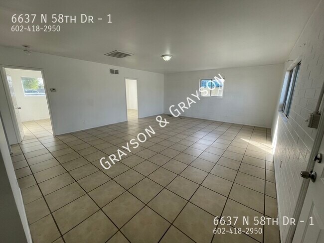 Foto del edificio - 6637 N 58th Dr