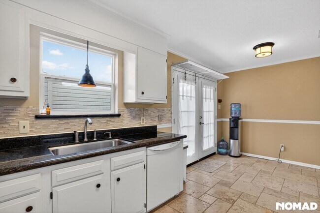 Building Photo - 8960 Manion Dr