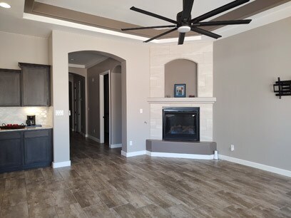 Living room with fireplace. - 7069 Crystal Dr NE