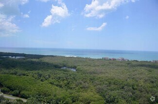 Building Photo - 7515 Pelican Bay Blvd