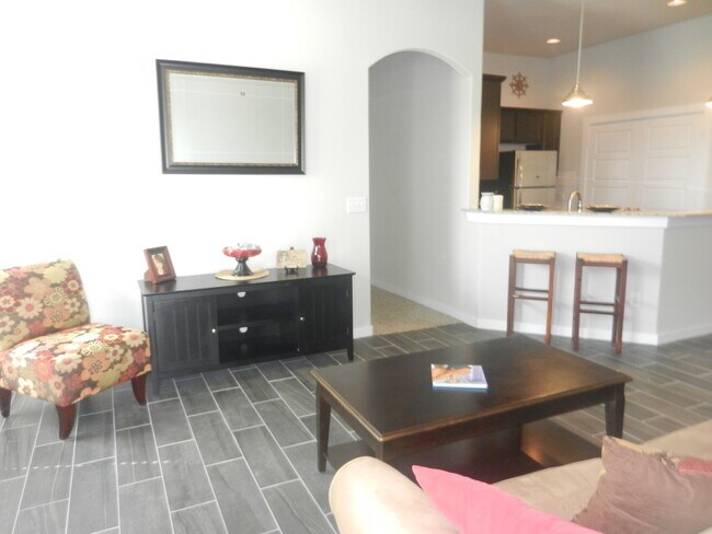 Building Photo - AVAILABLE NOW! LUXURY TOWNHOME LOCATED IN ...