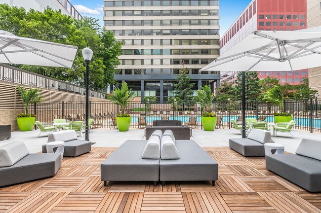 Landscaped Sundeck with Cabanas, Plush Seating, and Lounge Chairs - Crystal Square