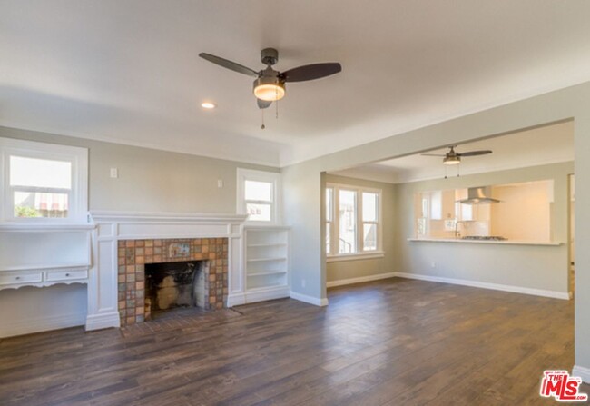 Newly remodeled, open-concept Living and Dining areas, featuring beautiful new hardwood flooring! - 1814 Browning Blvd