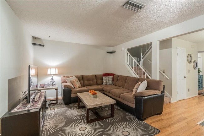 Building Photo - Spacious Hidden Haven Townhome